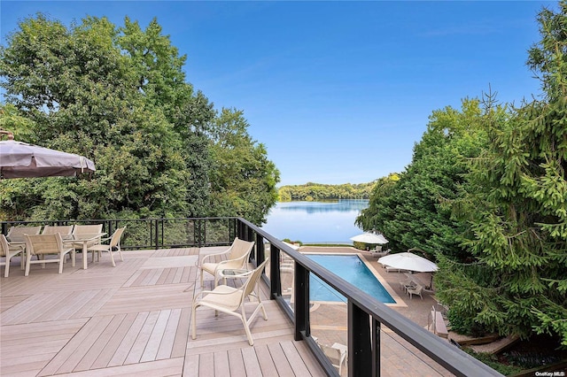 wooden terrace with a water view