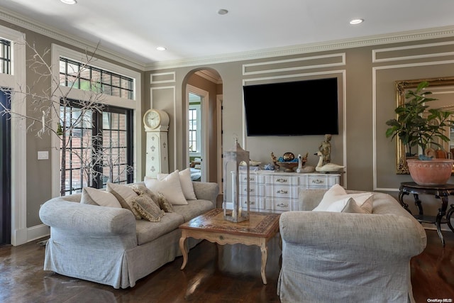 living room with crown molding and dark wood-type flooring