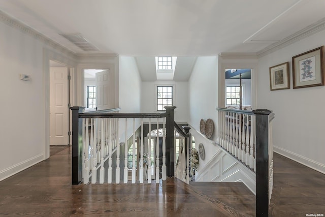 hall with dark wood-type flooring and vaulted ceiling