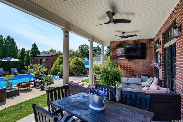 1974 Monroe Ave, North Bellmore, NY 11710 - view of patio / terrace with outdoor dining space, an outdoor living space with a fire pit, and a ceiling fan