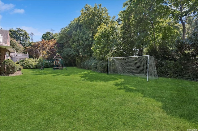 view of yard with a playground