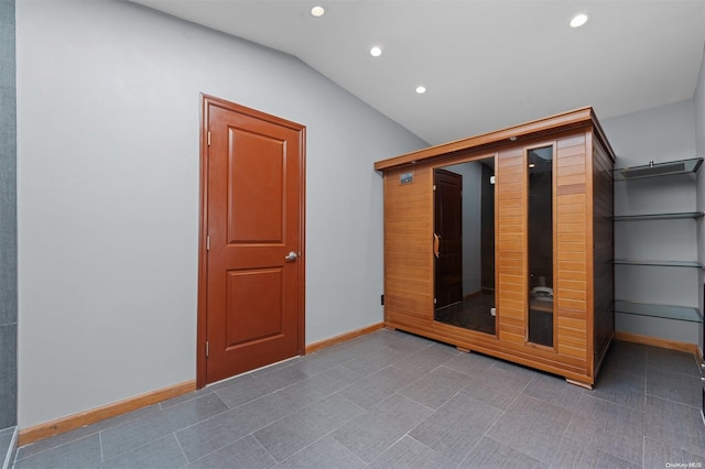 interior space featuring lofted ceiling