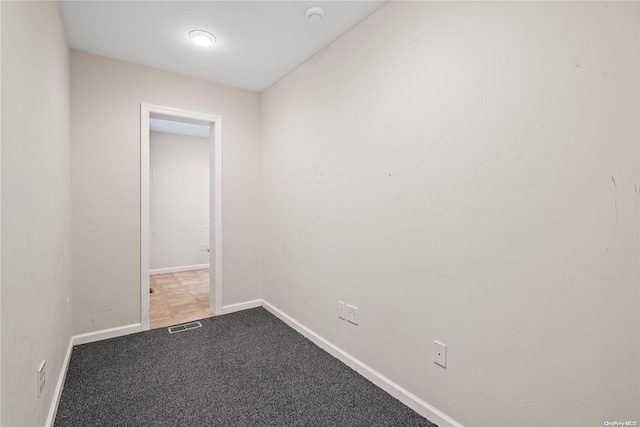 empty room with carpet floors