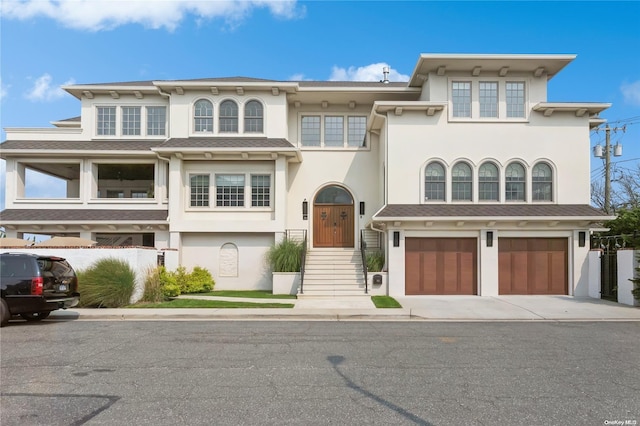 view of front of property with a garage