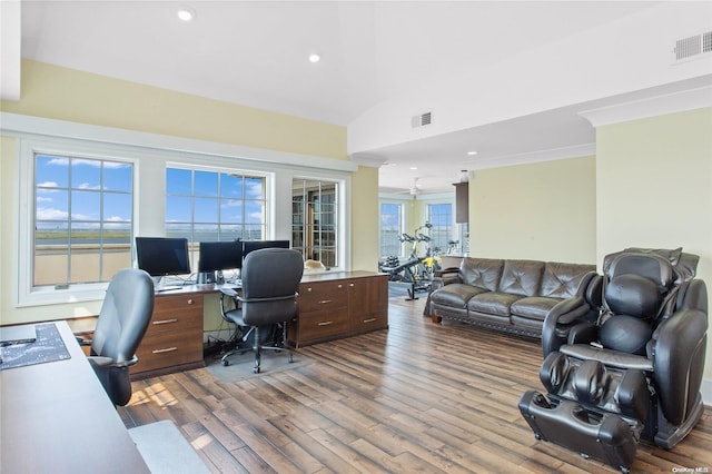 office space with hardwood / wood-style floors and vaulted ceiling