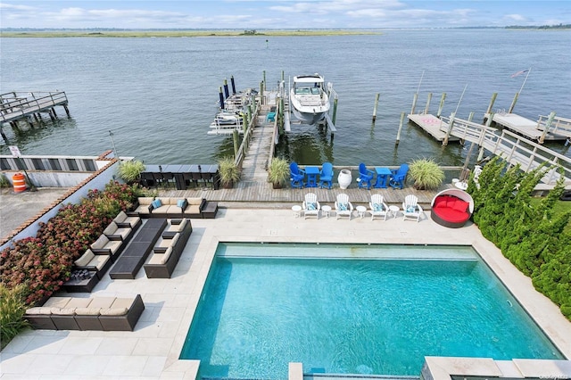 exterior space featuring a boat dock, a water view, and a patio area