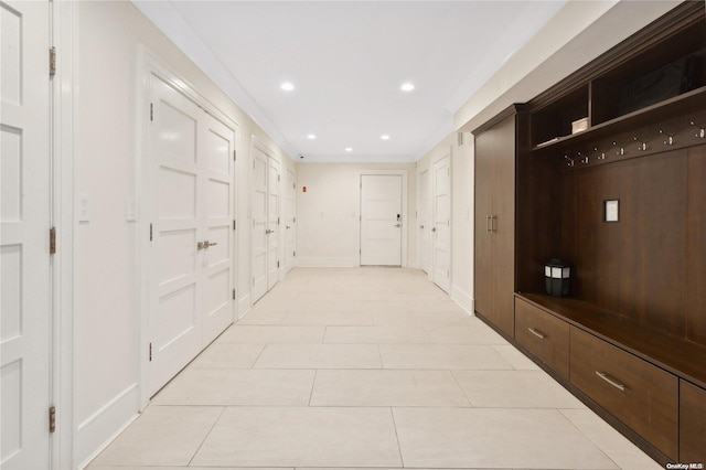 hallway with light tile patterned floors