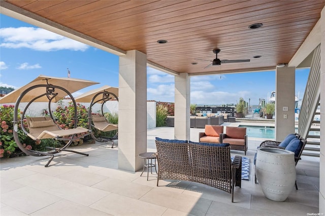 view of patio / terrace featuring ceiling fan and an outdoor hangout area