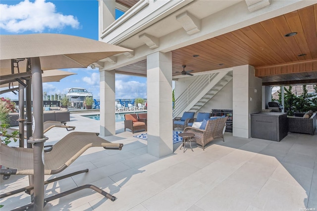 view of patio / terrace with outdoor lounge area and ceiling fan