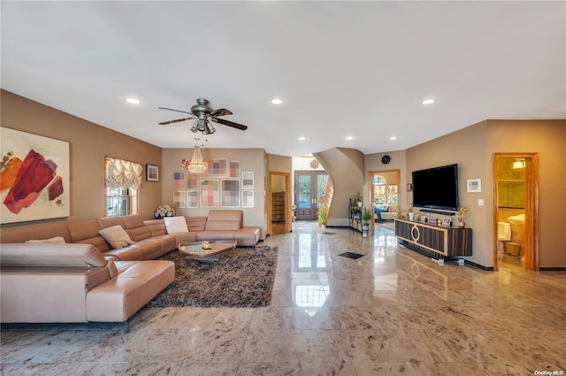 living room with french doors and ceiling fan