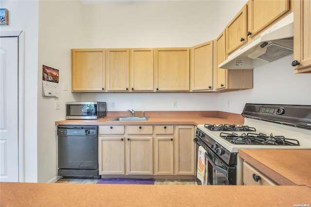 kitchen featuring sink, light brown cabinetry, black dishwasher, and range with gas stovetop