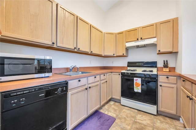 kitchen featuring white gas range, sink, black dishwasher, light brown cabinetry, and light tile patterned floors