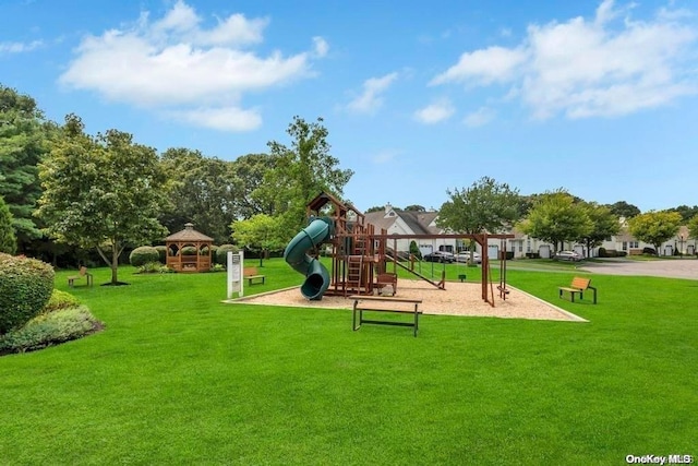 view of playground featuring a lawn and a gazebo