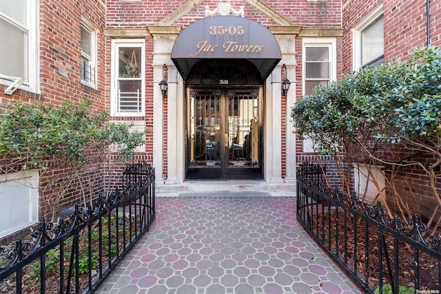 view of exterior entry featuring french doors