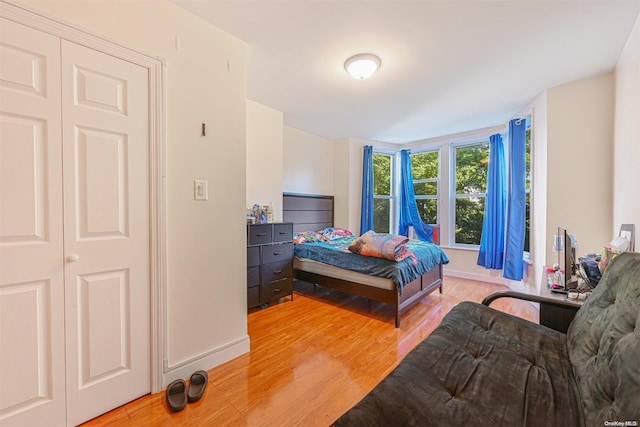 bedroom featuring hardwood / wood-style floors