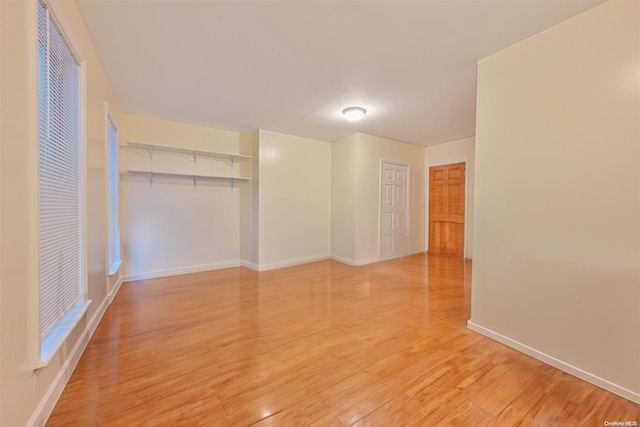 unfurnished room featuring light hardwood / wood-style flooring