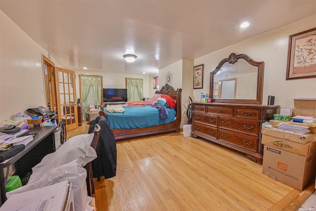 bedroom with light hardwood / wood-style flooring