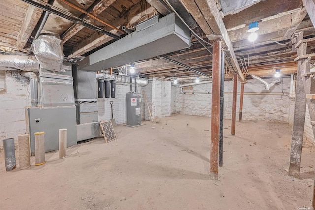 basement featuring electric water heater and heating unit