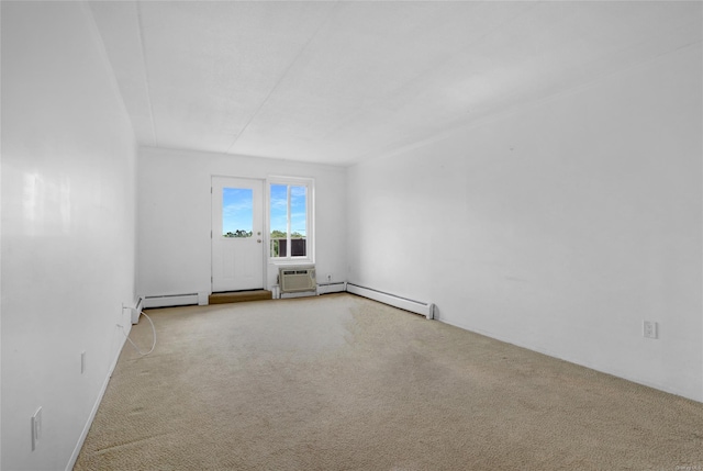 135 Post Ave Unit 6L, Westbury, NY 11590 - carpeted empty room with baseboard heating and an AC wall unit
