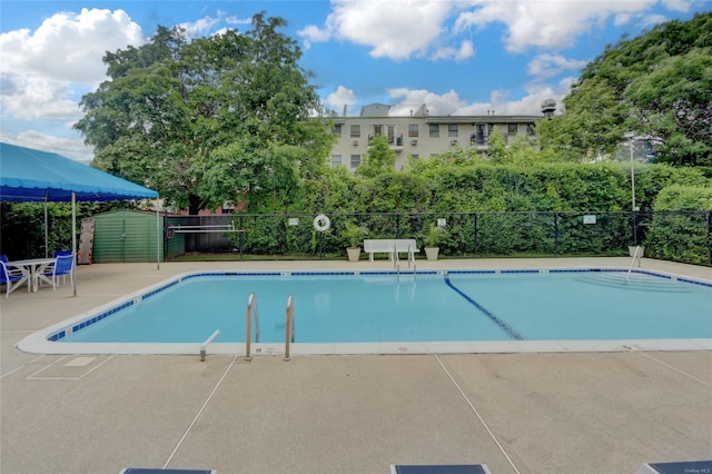 135 Post Ave Unit 6L, Westbury, NY 11590 - community pool featuring a patio
