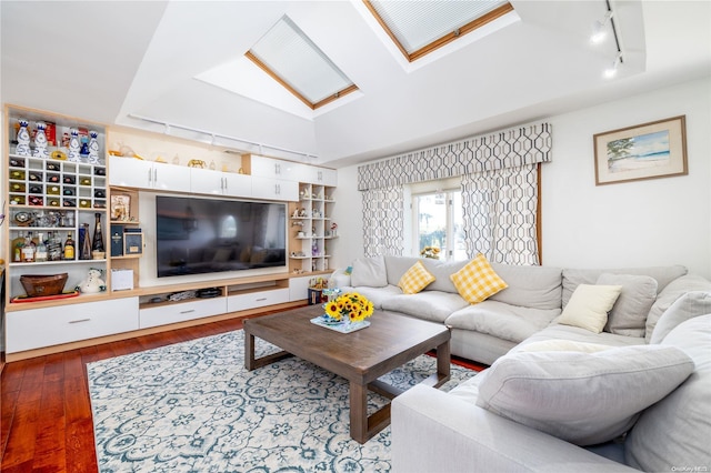 3461 Ocean Ave, Oceanside, NY 11572 - living room featuring a skylight, rail lighting, and wood finished floors