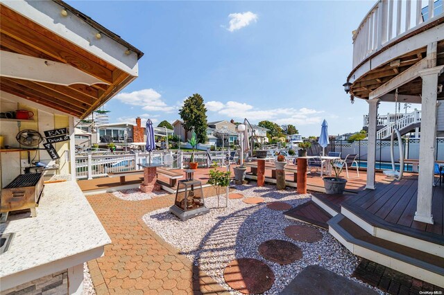 3461 Ocean Ave, Oceanside, NY 11572 - view of patio / terrace with a wooden deck and a residential view
