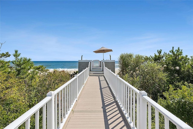 view of home's community with a view of the beach and a water view