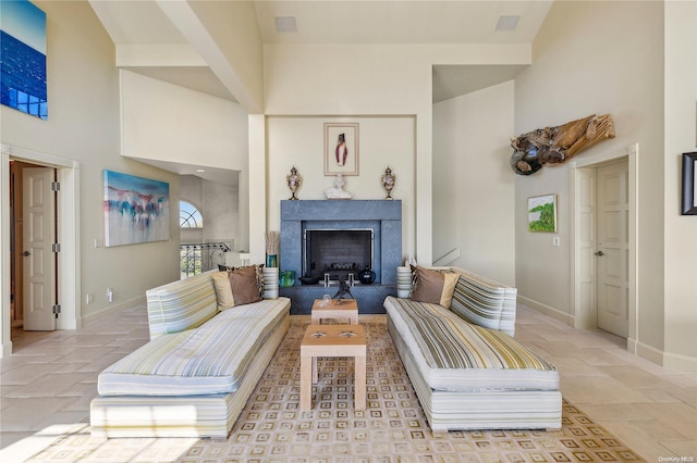 living room with a high ceiling