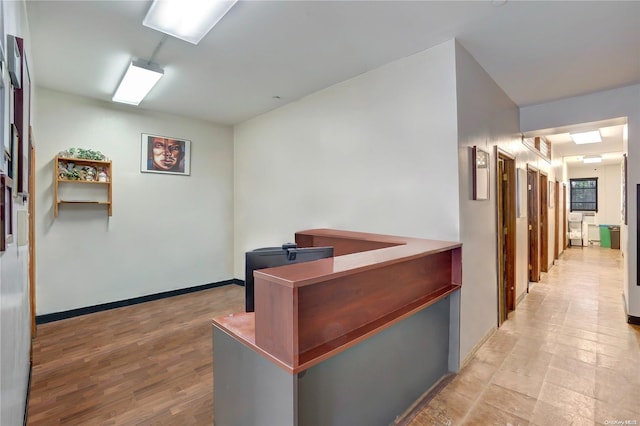 home office with light wood-type flooring