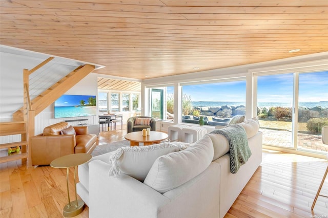 living room with wooden ceiling and light hardwood / wood-style flooring