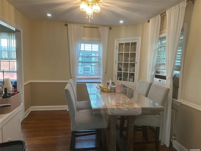 dining space featuring dark hardwood / wood-style floors and cooling unit