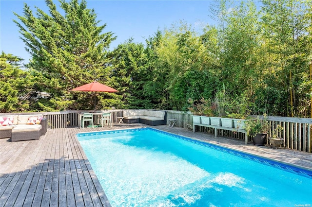 view of pool featuring an outdoor hangout area and a deck