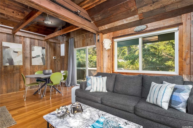 sunroom with beam ceiling and wood ceiling