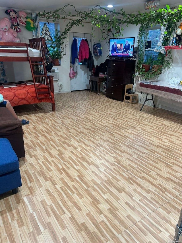 bedroom with light wood-type flooring