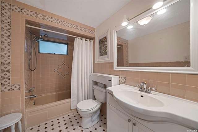 full bathroom featuring shower / bathtub combination with curtain, toilet, decorative backsplash, vanity, and tile walls