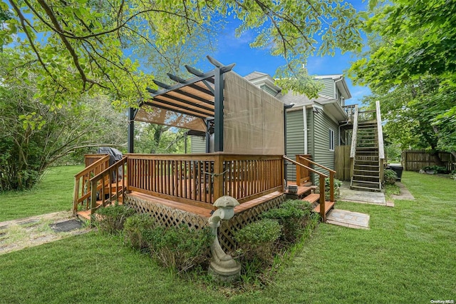 exterior space with a yard, a pergola, and a wooden deck