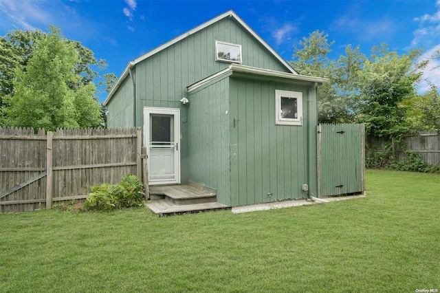 view of outdoor structure with a yard