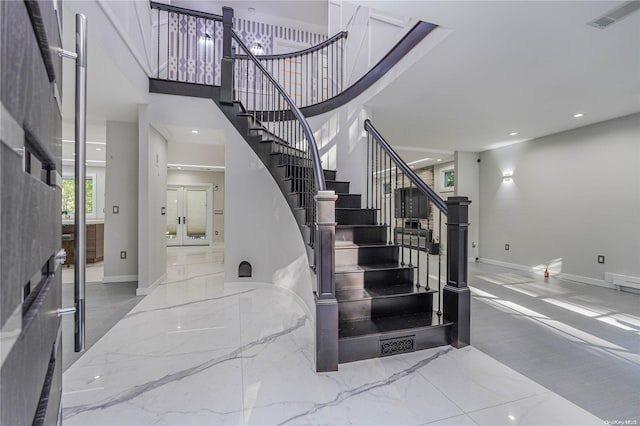 stairs with french doors