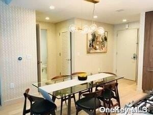 dining space featuring light hardwood / wood-style flooring