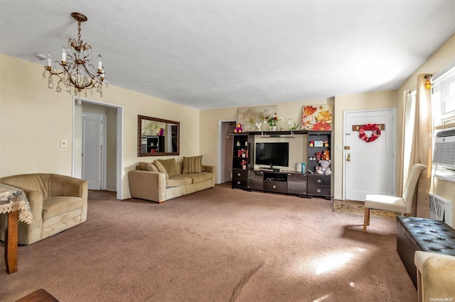 living room with carpet flooring and a notable chandelier