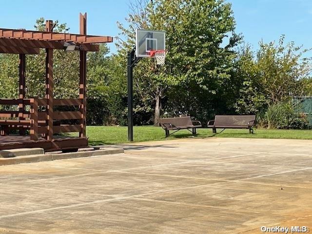 view of sport court with a pergola