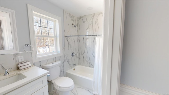 full bath with marble finish floor, shower / bath combination, vanity, and toilet