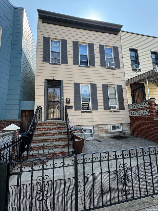 view of front of home featuring cooling unit