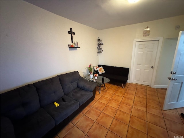 living room with tile patterned floors