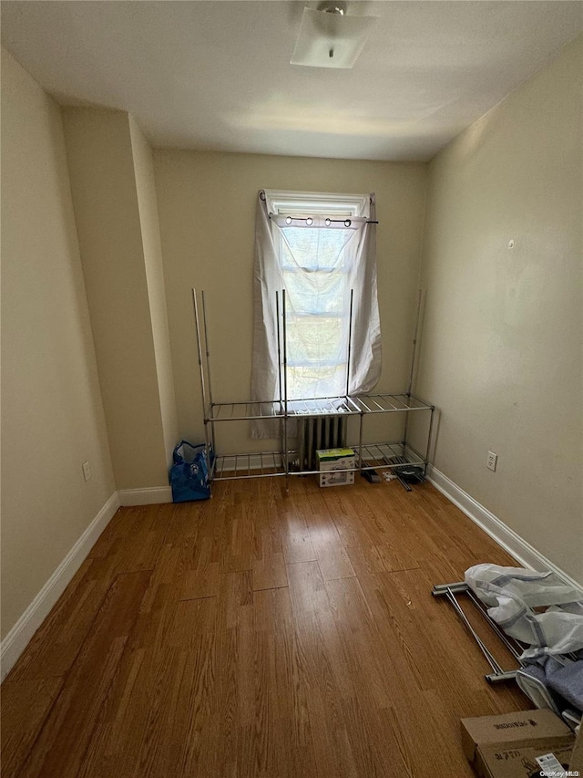 spare room featuring hardwood / wood-style flooring