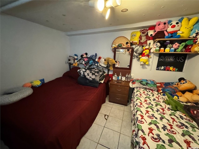 bedroom featuring light tile patterned floors