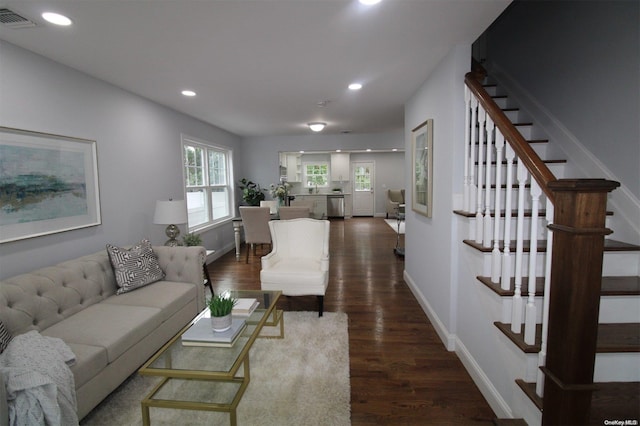 living room featuring dark hardwood / wood-style floors