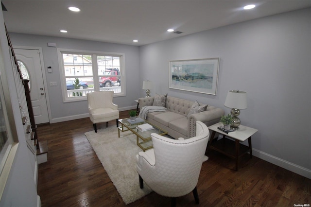 living room with dark hardwood / wood-style floors