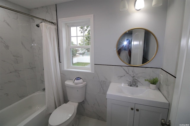 full bathroom featuring vanity, toilet, tile walls, and shower / tub combo with curtain