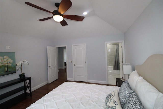 bedroom with ensuite bathroom, ceiling fan, lofted ceiling, and dark hardwood / wood-style floors